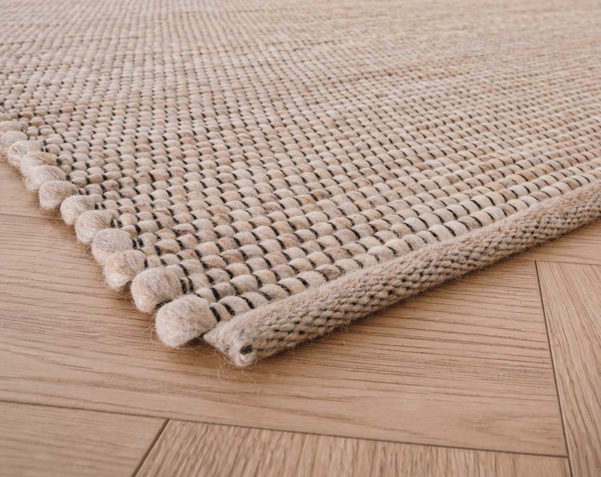 Wool rug - Lett beige/cream - close up hoek Wool rug - Lett beige/cream - close up hoek