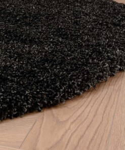 Round thick rug - Shaggy Grand anthracite - close up zijkant, thumbnail Round thick rug - Shaggy Grand anthracite - close up zijkant, thumbnail