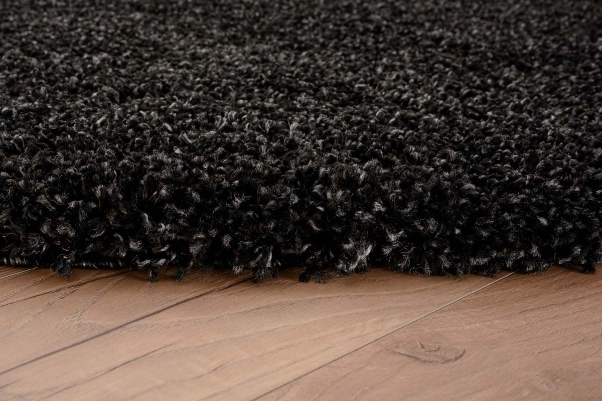 Round thick rug - Shaggy Grand anthracite - close up zijkant Round thick rug - Shaggy Grand anthracite - close up zijkant