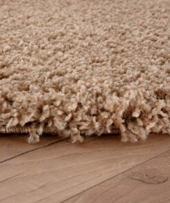 Round thick rug - Shaggy Grand beige - close up zijkant, thumbnail Round thick rug - Shaggy Grand beige - close up zijkant, thumbnail