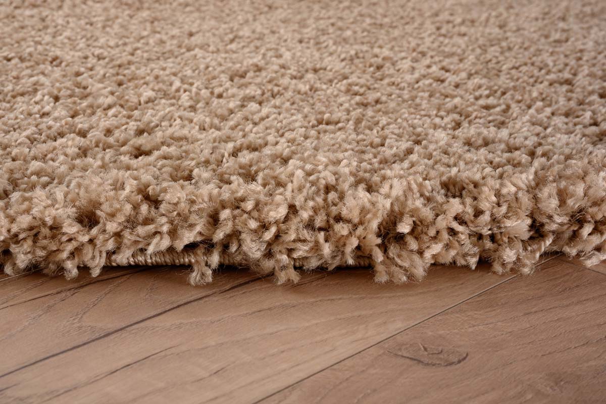 Round thick rug - Shaggy Grand beige - close up zijkant Round thick rug - Shaggy Grand beige - close up zijkant