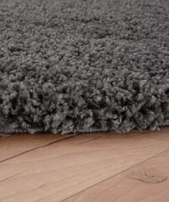 Round thick rug - Shaggy Grand dark grey - close up zijkant, thumbnail
