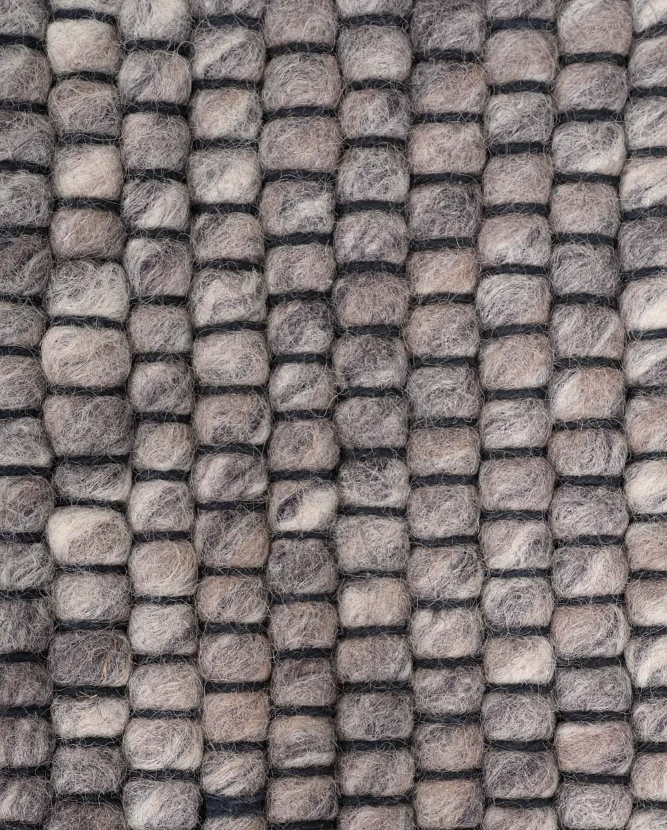 Round wool rug - Lett grey - close up materiaal Round wool rug - Lett grey - close up materiaal