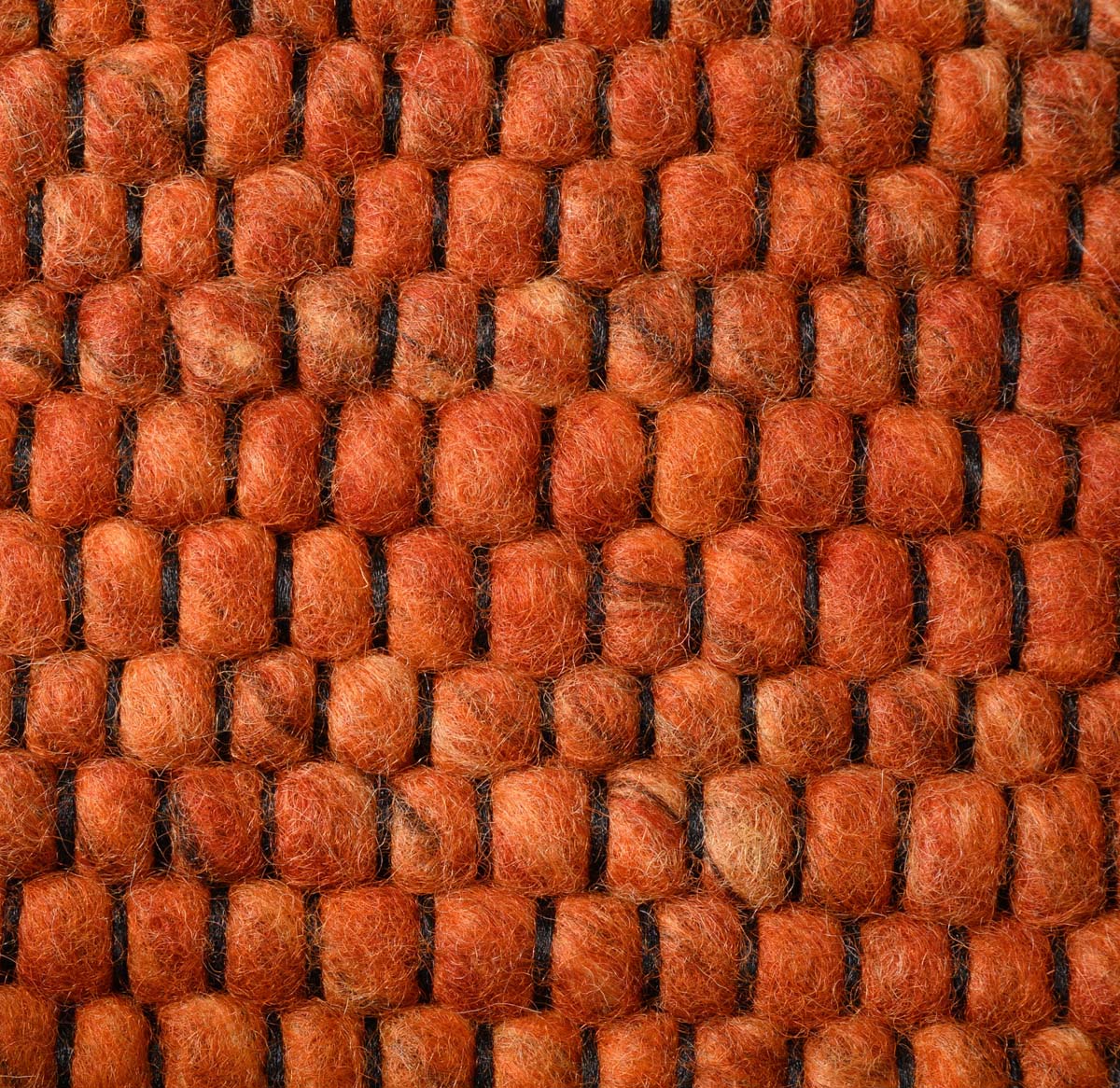 Oval wool rug - Lett cognac - close up Oval wool rug - Lett cognac - close up