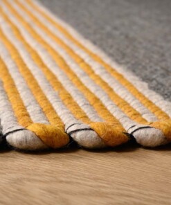 Wool rug - Lett ochre yellow/grey - close up, thumbnail