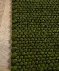 Wool rug - Lett green - close up zijkant, thumbnail