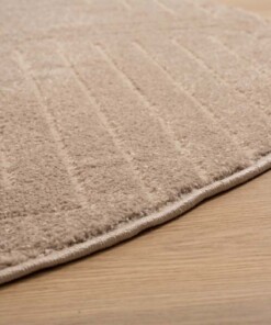 Round Scandinavian rug - Contour Edge beige - close up, thumbnail