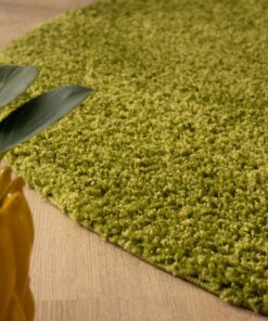 Round thick rug - Shaggy Trend green - close up, thumbnail