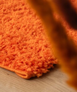 Square thick rug - Shaggy Trend orange - close up, thumbnail